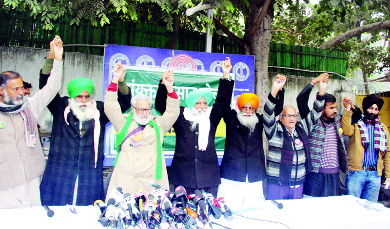 Political activist Yogendra Yadav and farmer leaders during a press conference at Press Club in New Delhi on Saturday. (UNI) Political activist Yogendra Yadav and farmer leaders during a press conference at Press Club in New Delhi on Saturday. (UNI)