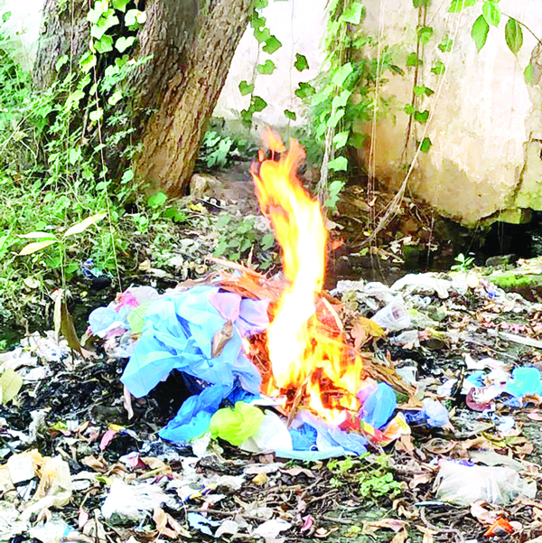 PPE kits being burnt openly in SMGS Hospital Jammu. PPE kits being burnt openly in SMGS Hospital Jammu.