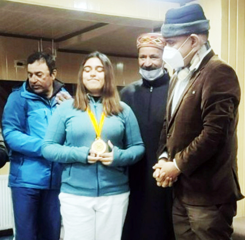 A player being awarded with medal by dignitary of the event at Srinagar. A player being awarded with medal by dignitary of the event at Srinagar.
