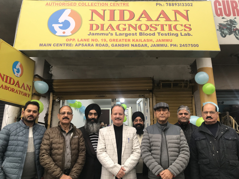 SP ACB Ravel Singh and others posing in front of Nidaan Diagnostics' new collection centre at Greater Kailash, Jammu. SP ACB Ravel Singh and others posing in front of Nidaan Diagnostics' new collection centre at Greater Kailash, Jammu.