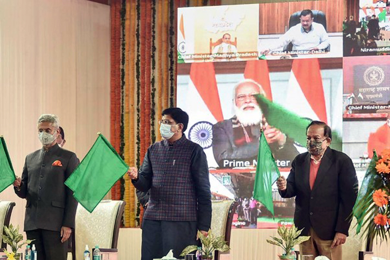 Union Railway Minister Piyush Goyal, External Affairs Minister S Jaishankar and Health Minister Harsh Vardhan wave green flags as Prime Minister Narendra Modi virtually flags off eight trains connecting Statue of Unity in Kevadia, Gujarat with different regions of the country, at Nizamuddin Railway Station in New Delhi on Sunday. Union Railway Minister Piyush Goyal, External Affairs Minister S Jaishankar and Health Minister Harsh Vardhan wave green flags as Prime Minister Narendra Modi virtually flags off eight trains connecting Statue of Unity in Kevadia, Gujarat with different regions of the country, at Nizamuddin Railway Station in New Delhi on Sunday.