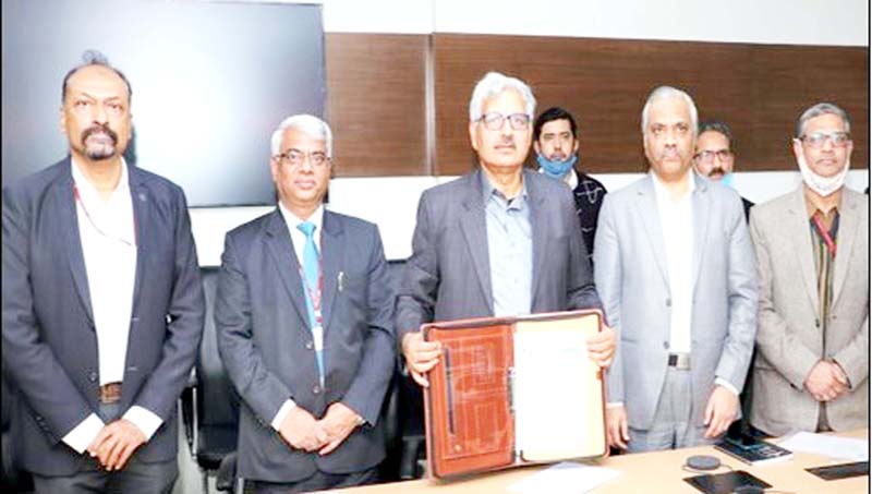 Representatives of NHPC and IREDA after signing MoU on Friday. Representatives of NHPC and IREDA after signing MoU on Friday.