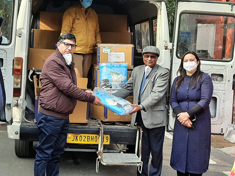 Pardeep Jain of Jainco Hero handing over PPE kits and masks to hospital staff at Jammu. Pardeep Jain of Jainco Hero handing over PPE kits and masks to hospital staff at Jammu.