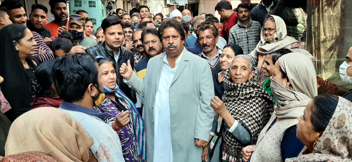 Cong leader Raman Bhalla interacting with people from Nai Basti, Satwari in Jammu on Friday. Cong leader Raman Bhalla interacting with people from Nai Basti, Satwari in Jammu on Friday.