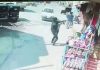A militant is seen in CCTV footage firing at police personnel in Baghat area of Srinagar on Friday.
