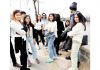 Tourists waiting on the Boulevard road in Srinagar to stay in the luxurious houseboats in the Dal lake on Saturday. (UNI)