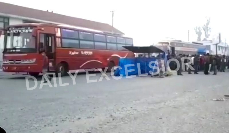 page1-8 Passengers protesting at Lakhanpur after they were forced to deboard an inter-State bus on Wednesday. —Excelsior/Pardeep