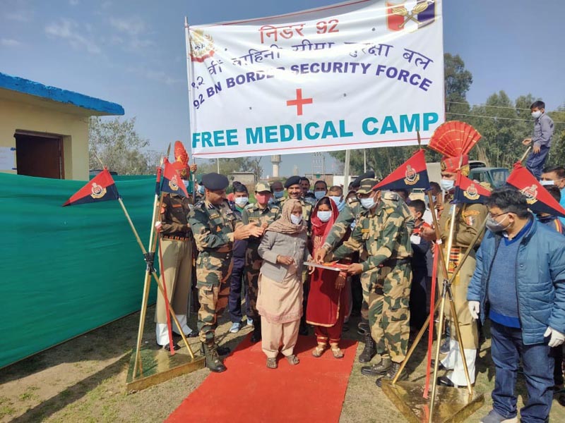 Commandant, 92 BSF Battalion, Sanjay Chauhan along with an elderly lady inaugurating medical camp at a border village in Jammu. Commandant, 92 BSF Battalion, Sanjay Chauhan along with an elderly lady inaugurating medical camp at a border village in Jammu.