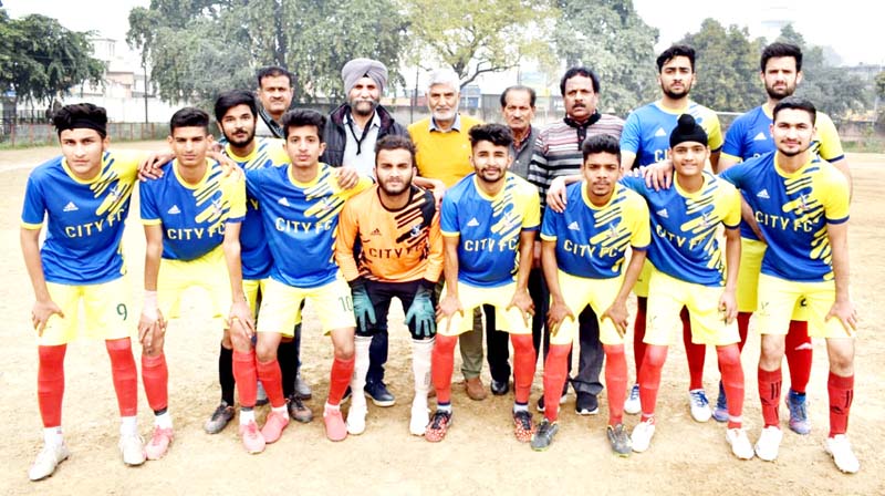 Winning team posing for a group photograph with dignitaries at Jammu. Winning team posing for a group photograph with dignitaries at Jammu.