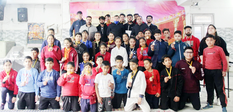 Winning students posing for a group photograph with dignitaries at Jammu. Winning students posing for a group photograph with dignitaries at Jammu.