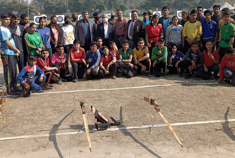 Winning players of Archery posing for group photograph along with dignitaries at Jammu. Winning players of Archery posing for group photograph along with dignitaries at Jammu.