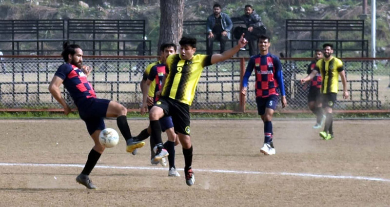 Players in action during a football match at GGM Science College Ground Jammu. Players in action during a football match at GGM Science College Ground Jammu.