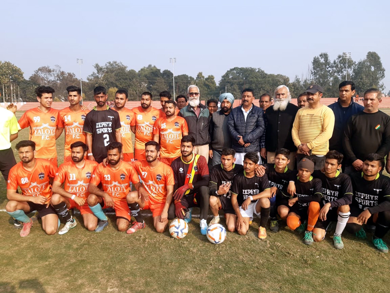 Winning Football team posing for a group photograph along with dignitaries at Kathua. Winning Football team posing for a group photograph along with dignitaries at Kathua.
