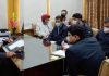 Advisor Baseer Khan chairing a meeting at Jammu on Monday.