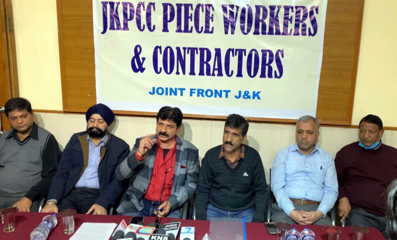 Leaders of JKPCC Piece Workers and Contractors Joint Front addressing a press conference at Jammu on Wednesday. Leaders of JKPCC Piece Workers and Contractors Joint Front addressing a press conference at Jammu on Wednesday.