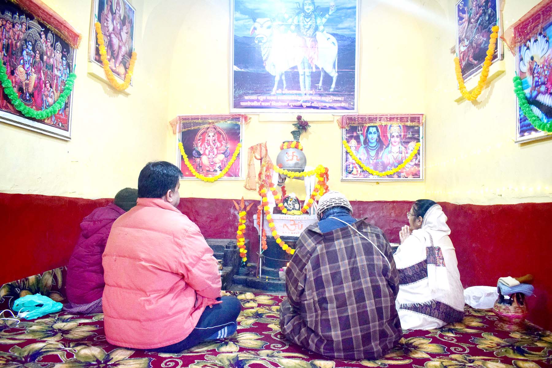 Kashmiri Pandits praying at Sheetalnath temple at Kral Khud in Srinagar. -Excelsior/Shakeel Kashmiri Pandits praying at Sheetalnath temple at Kral Khud in Srinagar. -Excelsior/Shakeel