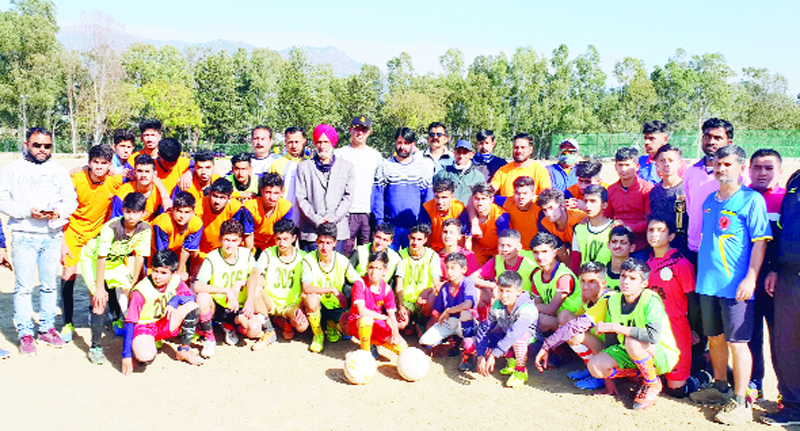 Winning team posing for a group photograph with dignitaries at Udhampur on Tuesday. Winning team posing for a group photograph with dignitaries at Udhampur on Tuesday.