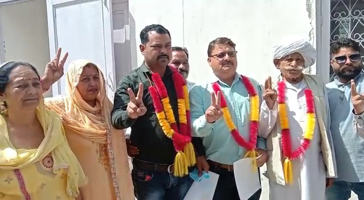The newly elected chairman and vice chairman MC Nagri showing signs of victory with their supporters on Friday. — Excelsio/Pardeep The newly elected chairman and vice chairman MC Nagri showing signs of victory with their supporters on Friday. — Excelsio/Pardeep