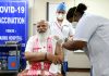 Prime Minister Narendra Modi takes his first dose of the COVID-19 vaccine at AIIMS in New Delhi on Monday.