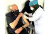 NC president Dr Farooq Abdullah gets his first dose of COVID-19 vaccine at SKIMS in Srinagar on Tuesday. (UNI)