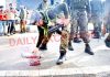 Security forces inspect the spot after militant attack on CRPF party at Lawaypora in Srinagar on Thursday. -Excelsior/Shakeel