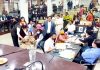 Congress Councillor Rajni Bala staging a sit-in during General House Meeting of JMC on Saturday.