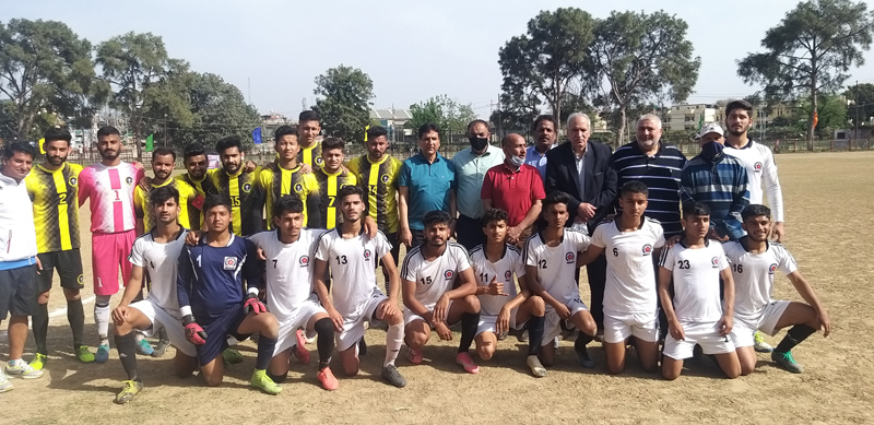 Winning team posing for a group photograph with dignitaries at GGM Science College Ground Jammu. Winning team posing for a group photograph with dignitaries at GGM Science College Ground Jammu.