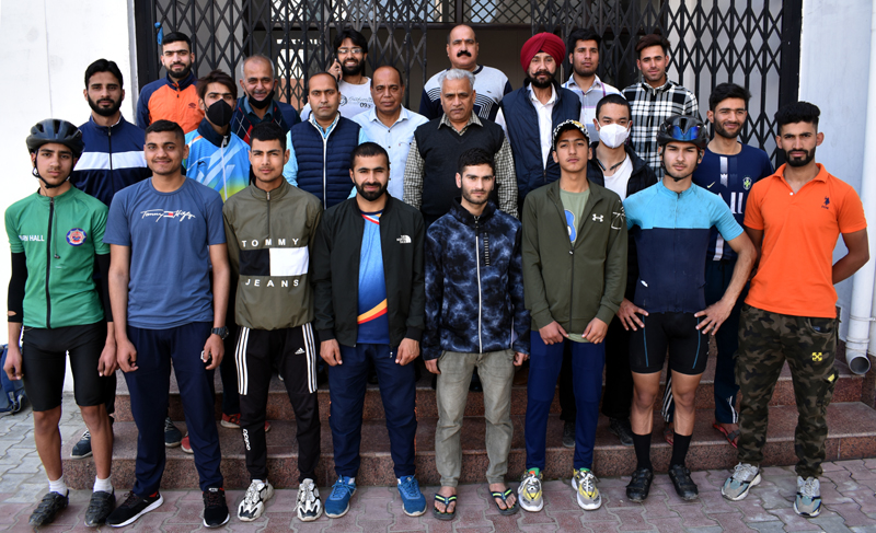 Selected cyclists and dignitaries posing for group photograph. Selected cyclists and dignitaries posing for group photograph.