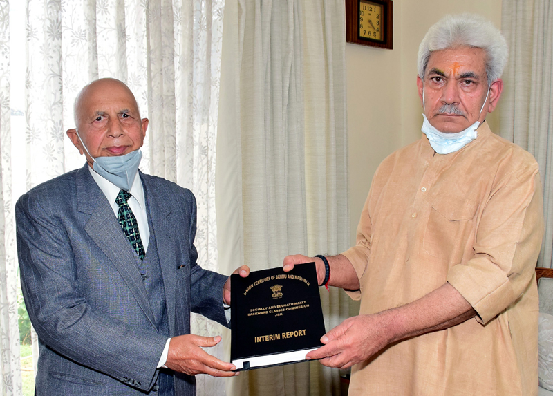 Lt Governor Manoj Sinha receiving interim report from Justice (Retd) G D Sharma on Saturday. Lt Governor Manoj Sinha receiving interim report from Justice (Retd) G D Sharma on Saturday.