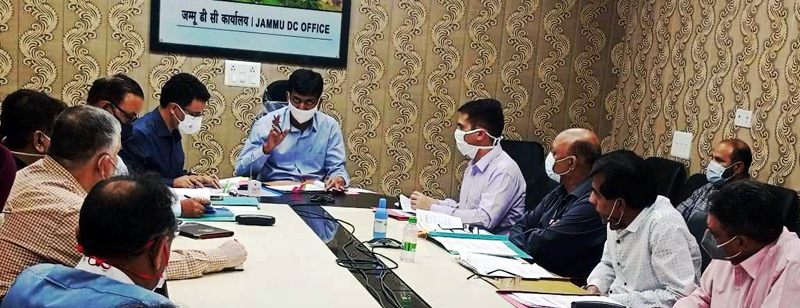 DC Anshul Garg chairing a meeting at Jammu on Saturday. DC Anshul Garg chairing a meeting at Jammu on Saturday.