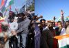 Cong activists staging protest against (left) and in support (right) of top AICC leader Ghulam Nabi Azad in Jammu on Tuesday. —Excelsior/Rakesh