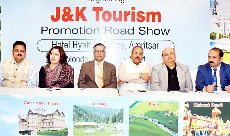 Officers of J&K Tourism Department and JATO representatives during a press conference in Amritsar. Officers of J&K Tourism Department and JATO representatives during a press conference in Amritsar.