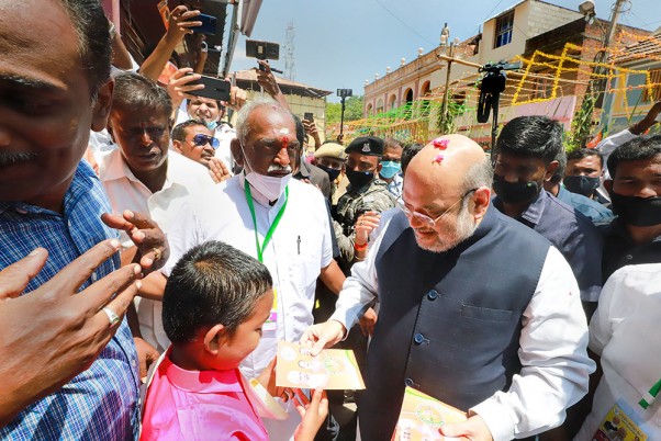 Union Home Minister and senior BJP leader Amit Shah meets supporters at the launch of Bharatiya Janata Party’s (BJP’s) Vetri Kodi Eandhi, a door-to-door campaign for Tamil Nadu Assembly elections, at Suchindram, Kanyakumari. Union Home Minister and senior BJP leader Amit Shah meets supporters at the launch of Bharatiya Janata Party’s (BJP’s) Vetri Kodi Eandhi, a door-to-door campaign for Tamil Nadu Assembly elections, at Suchindram, Kanyakumari.