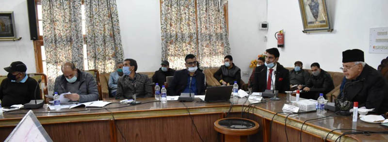Dr Farooq Abdullah chairing a meeting on Monday. Dr Farooq Abdullah chairing a meeting on Monday.