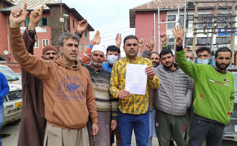Sarpanchs of Nagam block protesting on Monday. - Excelsior/Shakeel Sarpanchs of Nagam block protesting on Monday. - Excelsior/Shakeel