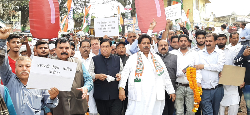 PCC Vice president Raman Bhalla leading Cong protest at Samba on Monday. PCC Vice president Raman Bhalla leading Cong protest at Samba on Monday.