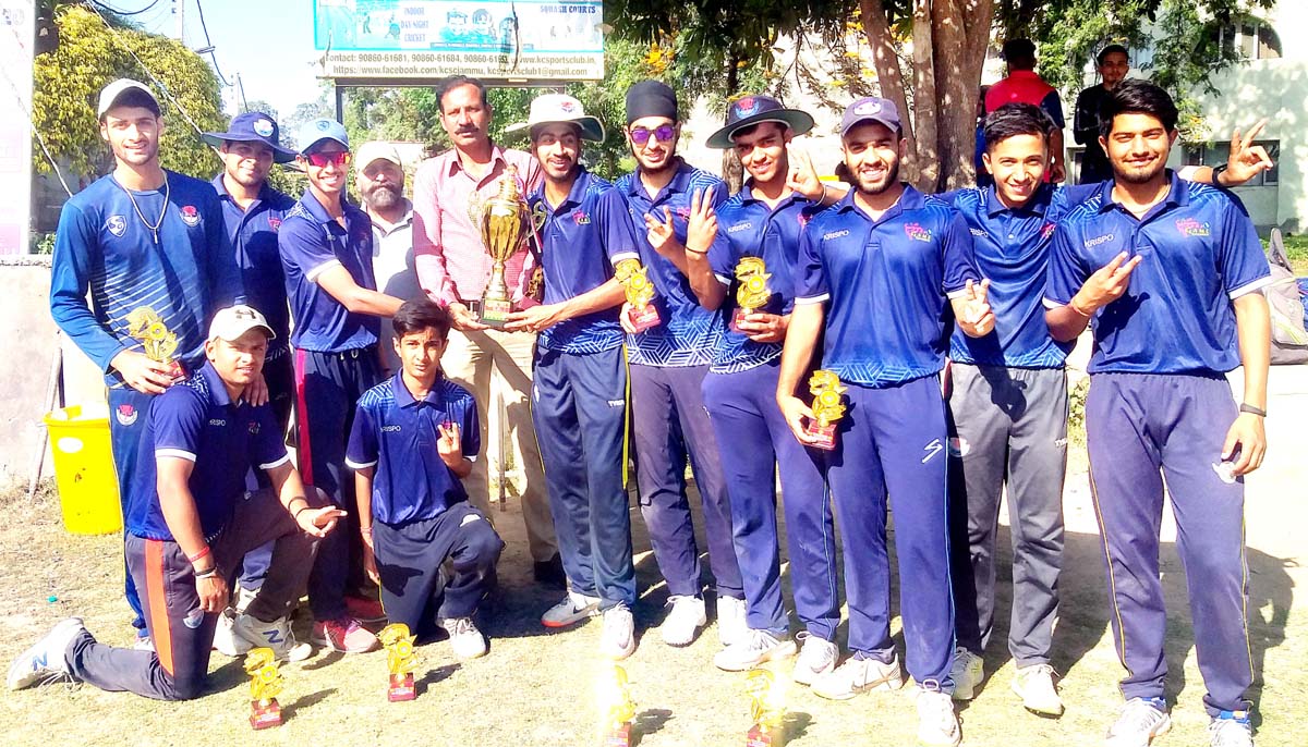 Winning team posing for group photograph with Rajesh Gill, former Ranji player at KC Sports Club Ground in Jammu. Winning team posing for group photograph with Rajesh Gill, former Ranji player at KC Sports Club Ground in Jammu.