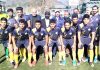 Winning team posing for a group photograph at TRC Ground Srinagar on Saturday.