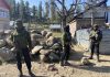 Security forces near encounter site at Choori Ki Gali in Shopian on Saturday. -Excelsior/Younis Khaliq