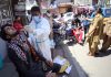 A man being tested for COVID-19 at City Chowk Jammu on Monday. -Excelsior/Rakesh