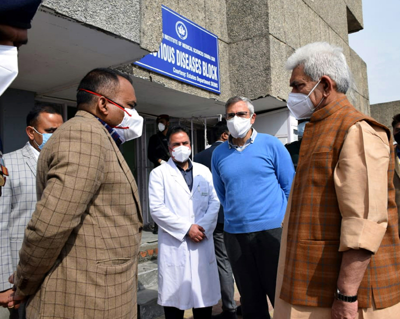 Lt Governor Manoj Sinha visited SKIMS on Sunday and met former Chief Minister Omar Abdullah and enquired about the health of NC president and sitting Member of Parliament Dr Farooq Abdullah. (UNI) Lt Governor Manoj Sinha visited SKIMS on Sunday and met former Chief Minister Omar Abdullah and enquired about the health of NC president and sitting Member of Parliament Dr Farooq Abdullah. (UNI)