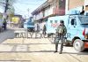 Security forces near encounter site at Jan Mohalla in Shopian on Friday. -Excelsior/Younis Khaliq