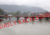 View of Zero Bridge over river Jhelum whose water level has gone up due to continuous rains in Srinagar. —Excelsior/Shakeel