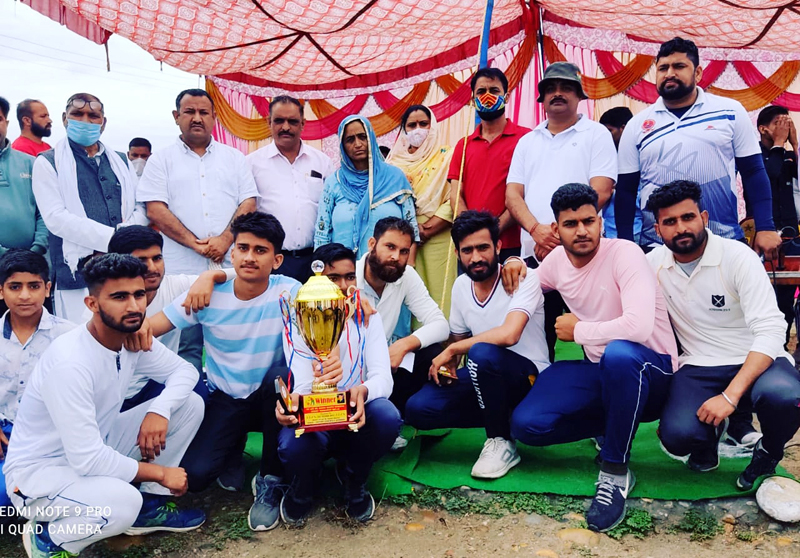 Winning team posing for a group photograph alog with trophy and dignitaries at Kodewala Akhnoor. Winning team posing for a group photograph alog with trophy and dignitaries at Kodewala Akhnoor.