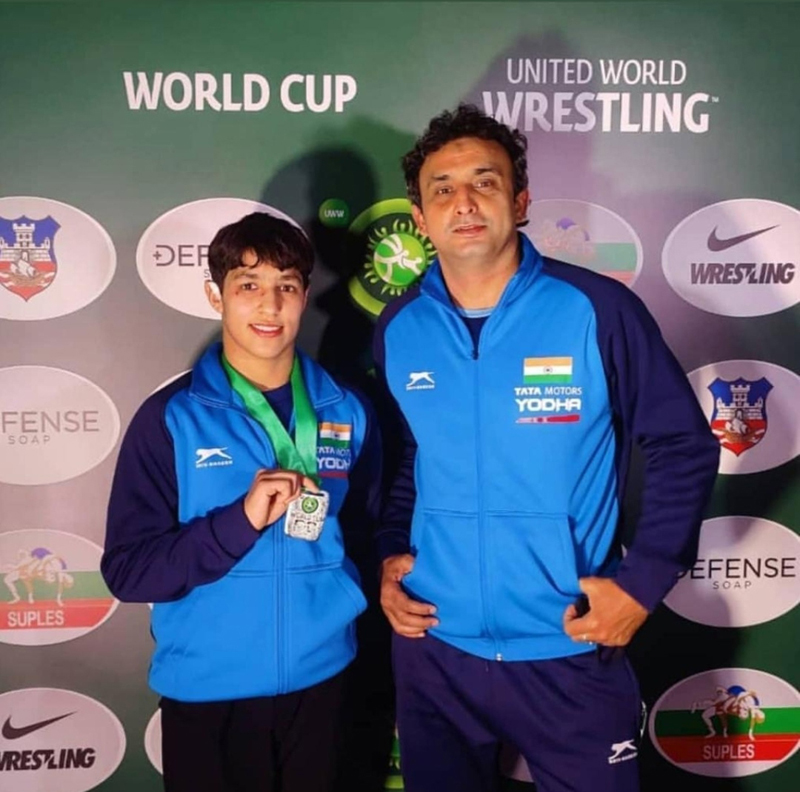 Wrestling coach Sahil Sharma along with his trainee Anshu Malik. Wrestling coach Sahil Sharma along with his trainee Anshu Malik.