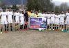 Winning Football team posing for a group photograph after the match at Kishtwar.