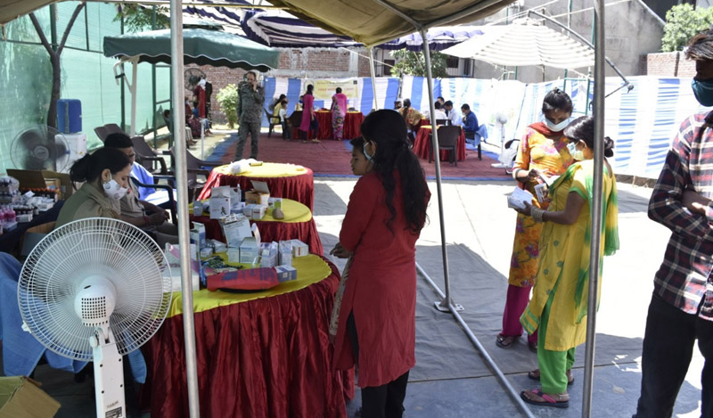 People getting medicines at a medical camp in Jammu. People getting medicines at a medical camp in Jammu.