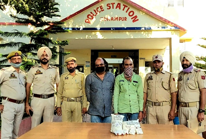 Smugglers alongwith cannabis in custody of Udhampur police. Smugglers alongwith cannabis in custody of Udhampur police.