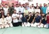Winners of Judo Championship displaying their medals along with dignitaries at Jammu.