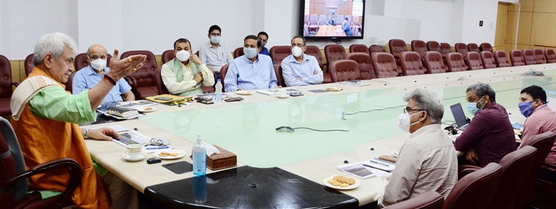 page3-5 Lt Governor Manoj Sinha chairing a meeting on Wednesday.